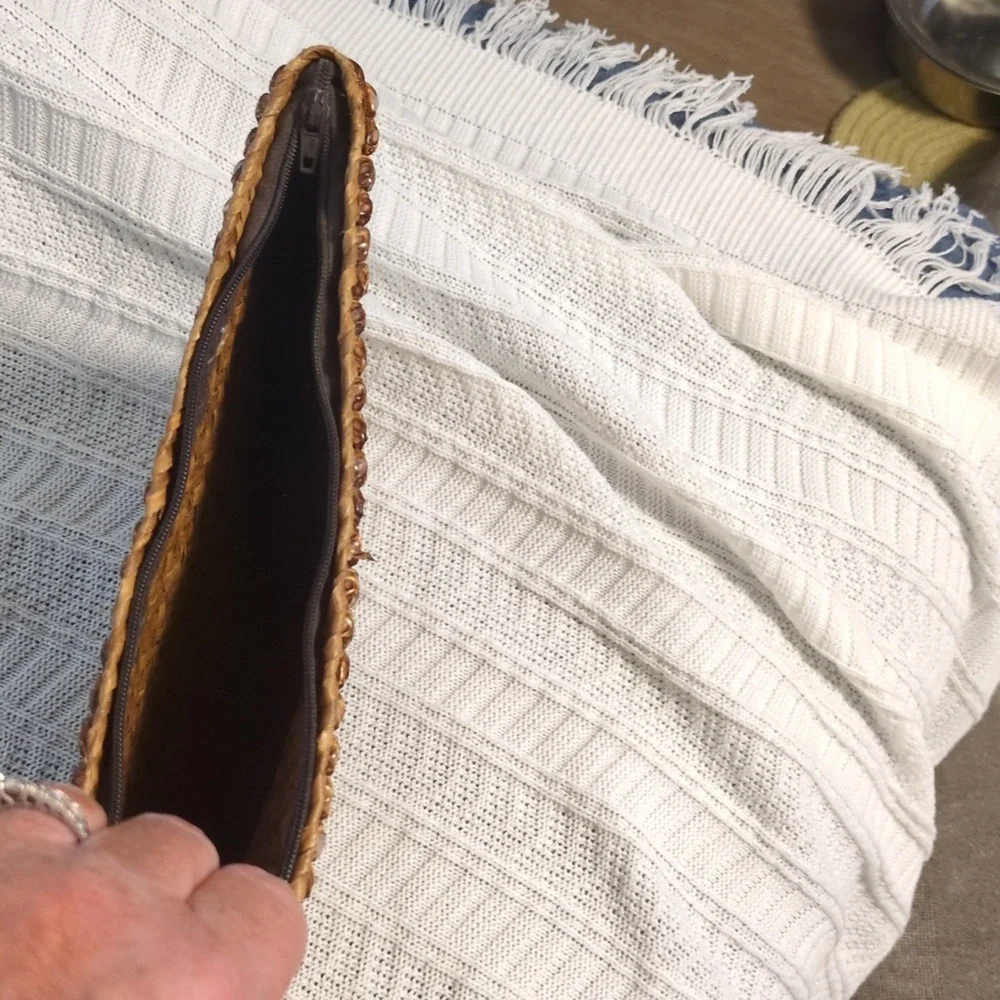 unbranded woven clutch